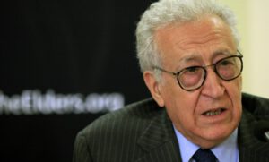 Diplomat Lakhdar Brahimi speaks with former U.S. President Jimmy Carter (not pictured) during a joint news conference in Khartoum