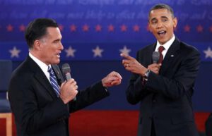 Republican presidential nominee Romney and U.S. President Obama answer a question at the same time during the second U.S. presidential campaign debate in Hempstead