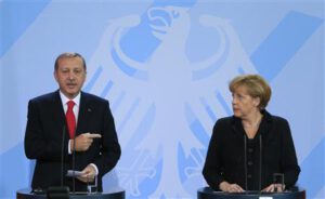 German Chancellor Merkel and Turkish Prime Minister Erdogan address media after talks in Berlin